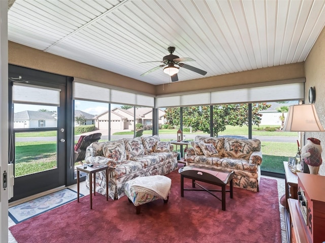 10986 SE 171st Street Rd, Summerfield, FL 34491 - sunroom / solarium with ceiling fan and an outdoor hangout area