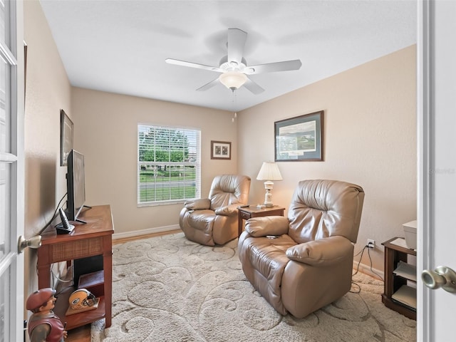 10986 SE 171st Street Rd, Summerfield, FL 34491 - living room featuring a ceiling fan and baseboards