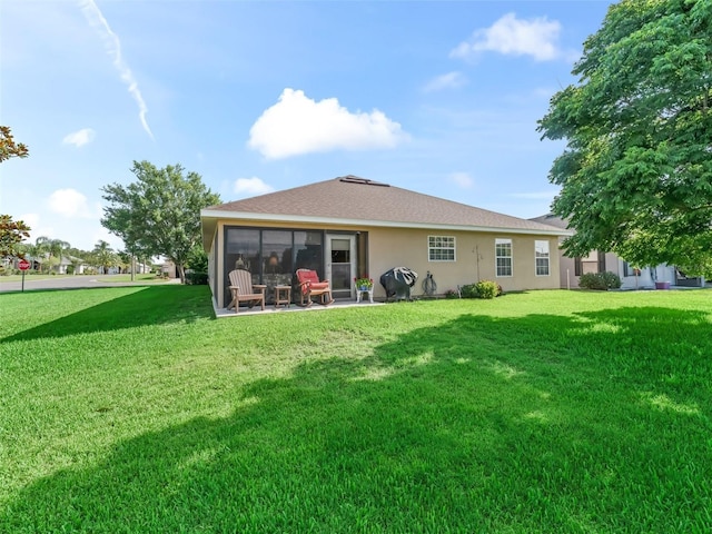 10986 SE 171st Street Rd, Summerfield, FL 34491 - rear view of house featuring stucco siding and a lawn