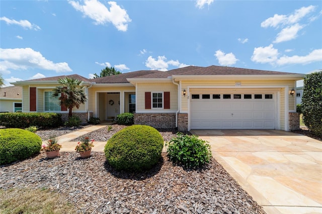13165 SE 93rd Cir, Summerfield, FL 34491 - ranch-style home with a garage, concrete driveway, and brick siding