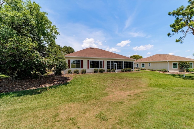 13165 SE 93rd Cir, Summerfield, FL 34491 - back of house with a yard