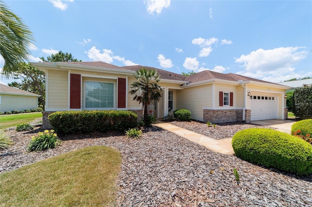 13165 SE 93rd Cir, Summerfield, FL 34491 - ranch-style house featuring a garage and brick siding