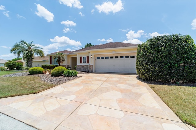 13165 SE 93rd Cir, Summerfield, FL 34491 - ranch-style home featuring driveway, an attached garage, a front yard, and brick siding