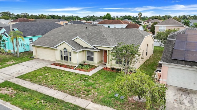 2896 Picadilly Cir, Kissimmee, FL 34747 - view of front of house with concrete driveway, a residential view, roof with shingles, stucco siding, and a front yard