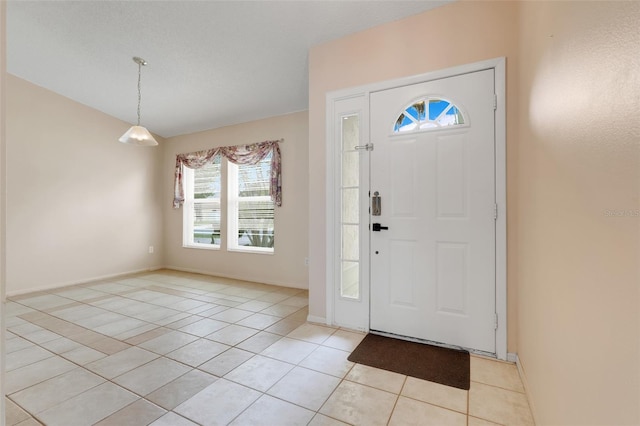2896 Picadilly Cir, Kissimmee, FL 34747 - entrance foyer featuring light tile patterned flooring and baseboards