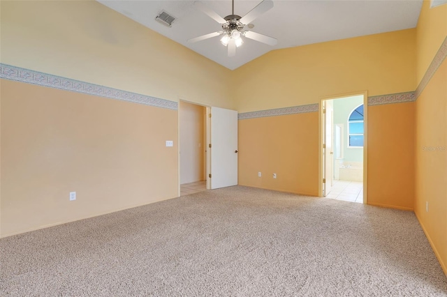 2896 Picadilly Cir, Kissimmee, FL 34747 - spare room featuring ceiling fan, light colored carpet, and high vaulted ceiling