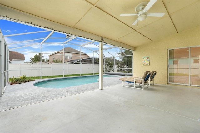 2896 Picadilly Cir, Kissimmee, FL 34747 - view of pool featuring a patio area, ceiling fan, and glass enclosure