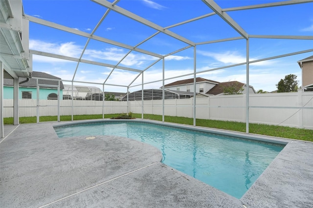 2896 Picadilly Cir, Kissimmee, FL 34747 - view of swimming pool with a fenced backyard, a patio area, and a lanai