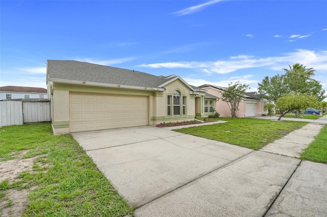 2896 Picadilly Cir, Kissimmee, FL 34747 - view of front of house featuring an attached garage, stucco siding, and concrete driveway
