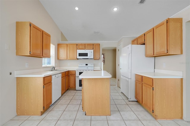 2896 Picadilly Cir, Kissimmee, FL 34747 - kitchen with white appliances, a sink, a kitchen island, light countertops, and recessed lighting