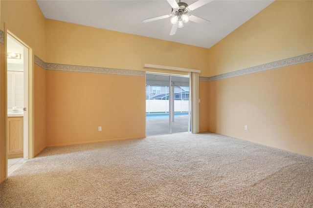 2896 Picadilly Cir, Kissimmee, FL 34747 - unfurnished room featuring carpet floors, ceiling fan, and vaulted ceiling