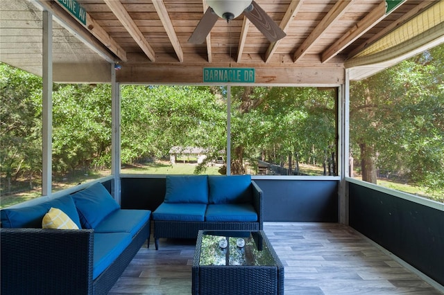 5581 SW 197th Ter, Dunnellon, FL 34431 - sunroom with outdoor lounge area, ceiling fan, healthy amount of natural light, and beam ceiling