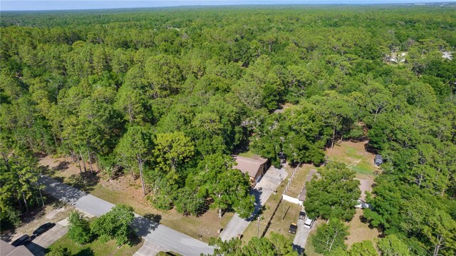 5581 SW 197th Ter, Dunnellon, FL 34431 - aerial view of property and surrounding area with a heavily wooded area