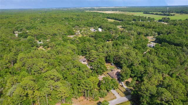 5581 SW 197th Ter, Dunnellon, FL 34431 - aerial view of property's location featuring a heavily wooded area