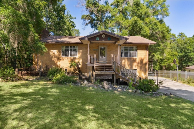 5581 SW 197th Ter, Dunnellon, FL 34431 - view of front of house featuring brick siding and concrete driveway
