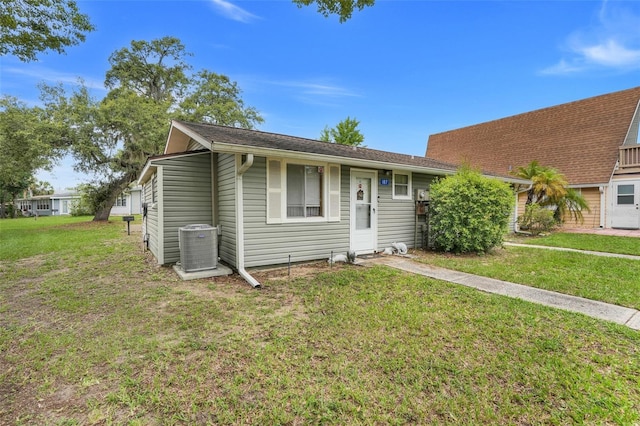 10301 US Highway 27 Unit 187, Clermont, FL 34711 - view of front of house with a front lawn and central air condition unit