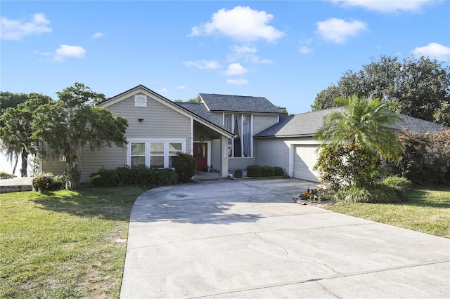 1226 Overlook Rd, Eustis, FL 32726 - traditional-style house featuring driveway, an attached garage, and a front lawn