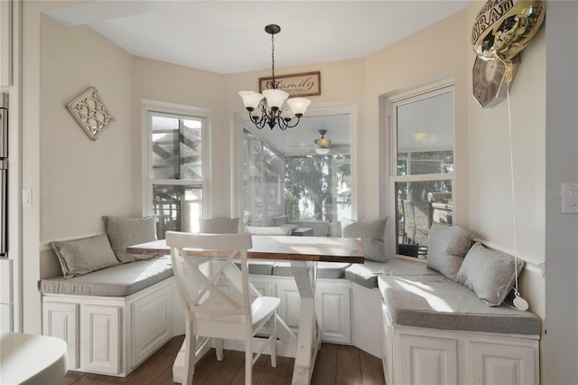 1226 Overlook Rd, Eustis, FL 32726 - dining room featuring a chandelier and wood finished floors