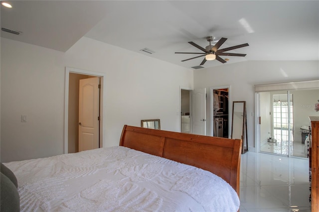11036 Bronson Rd, Clermont, FL 34711 - bedroom with a walk in closet, tile patterned flooring, a ceiling fan, a closet, and lofted ceiling