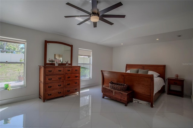11036 Bronson Rd, Clermont, FL 34711 - bedroom featuring lofted ceiling, a ceiling fan, and light tile patterned floors