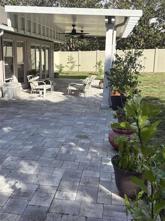 11036 Bronson Rd, Clermont, FL 34711 - view of patio / terrace featuring ceiling fan and french doors