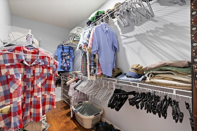 612 Lisbon Ln, The Villages, FL 32159 - spacious closet with wood finished floors