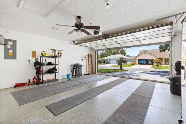 612 Lisbon Ln, The Villages, FL 32159 - garage with electric panel and ceiling fan