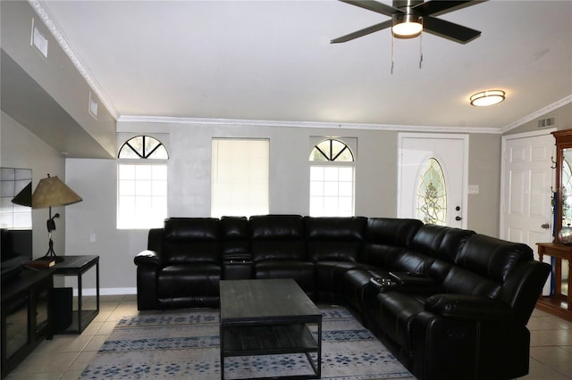705 Poinsettia Ave, Fruitland Park, FL 34731 - living room featuring light tile patterned flooring, ceiling fan, ornamental molding, and baseboards
