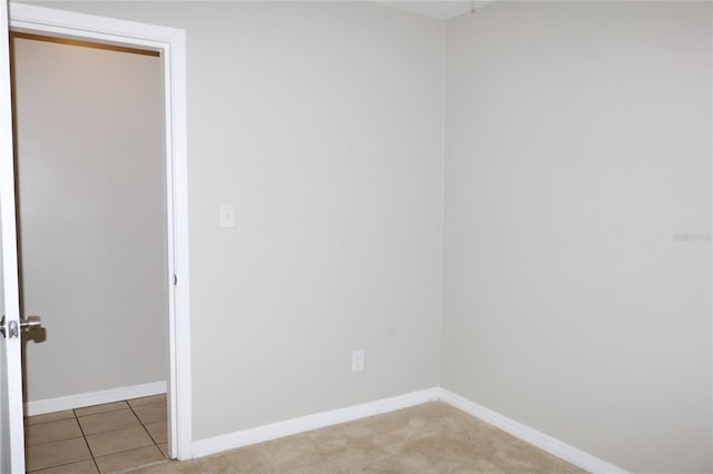 705 Poinsettia Ave, Fruitland Park, FL 34731 - unfurnished room featuring baseboards and light colored carpet