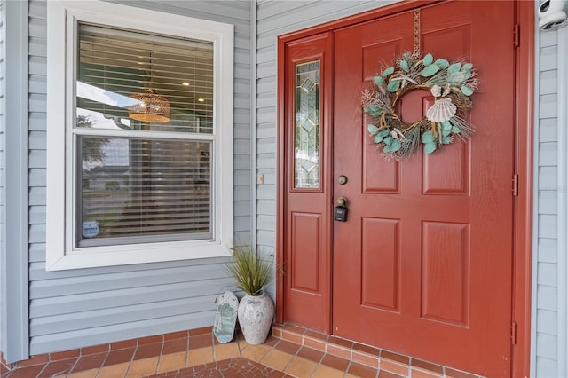 8980 SE 176th Limerick Ln, The Villages, FL 32162 - view of exterior entry with a porch