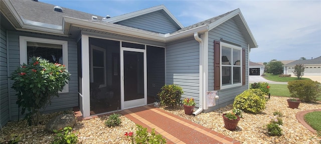 8980 SE 176th Limerick Ln, The Villages, FL 32162 - property entrance with a shingled roof