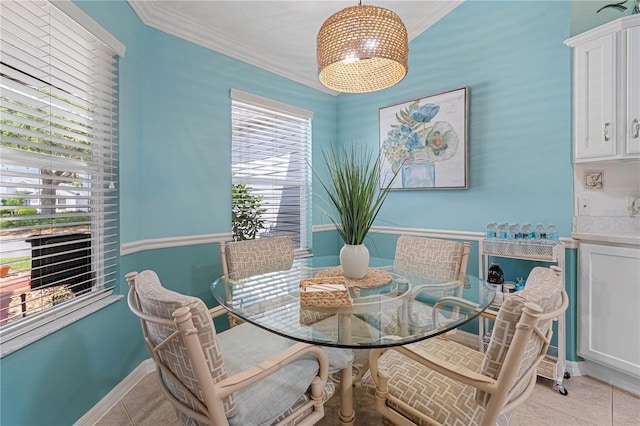 8980 SE 176th Limerick Ln, The Villages, FL 32162 - dining space with ornamental molding, light tile patterned flooring, and baseboards
