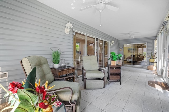8980 SE 176th Limerick Ln, The Villages, FL 32162 - sunroom featuring a ceiling fan and plenty of natural light