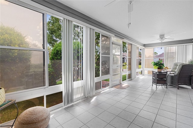 8980 SE 176th Limerick Ln, The Villages, FL 32162 - sunroom featuring tile patterned flooring
