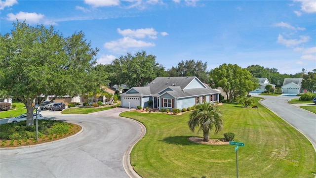 8980 SE 176th Limerick Ln, The Villages, FL 32162 - single story home with an attached garage, driveway, a front yard, and a residential view