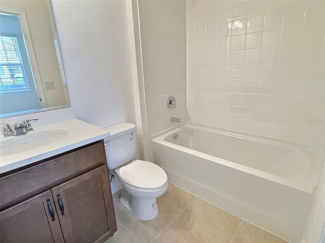 358 Switchgrass Loop, Minneola, FL 34715 - bathroom featuring toilet, vanity, tile patterned floors, and  shower combination