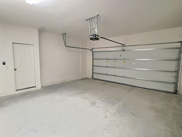 358 Switchgrass Loop, Minneola, FL 34715 - garage featuring a garage door opener