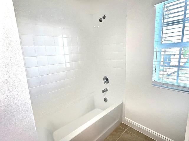 358 Switchgrass Loop, Minneola, FL 34715 - full bathroom featuring tile patterned floors, baseboards, and tub / shower combination