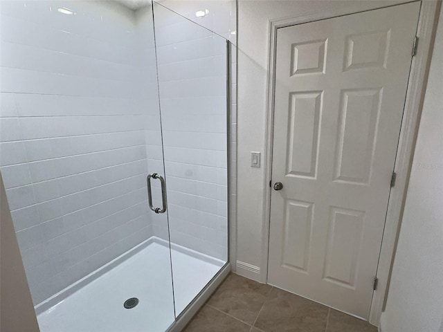 358 Switchgrass Loop, Minneola, FL 34715 - full bathroom with a shower stall and tile patterned flooring