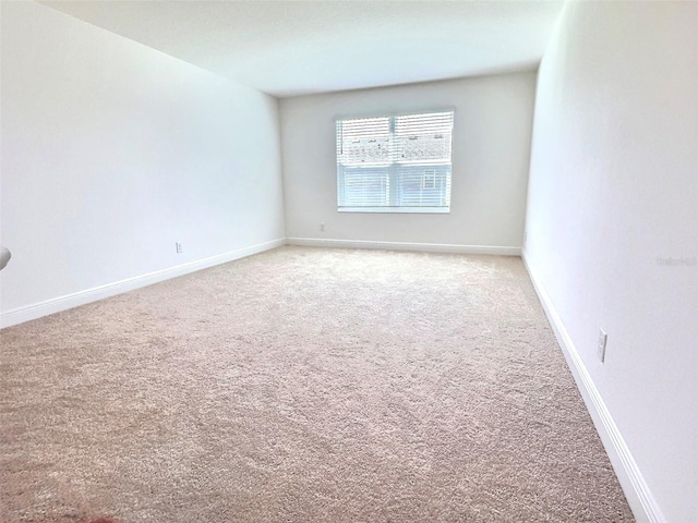 358 Switchgrass Loop, Minneola, FL 34715 - spare room featuring light colored carpet and baseboards