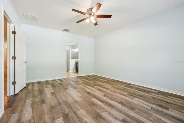 185 Hamlet Loop, Davenport, FL 33837 - spare room with a ceiling fan and wood finished floors
