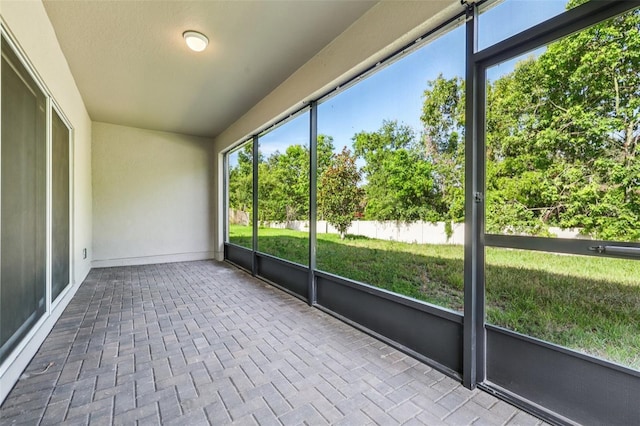 185 Hamlet Loop, Davenport, FL 33837 - unfurnished sunroom featuring plenty of natural light
