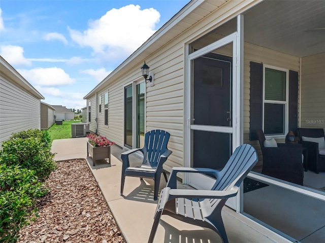 6301 Whittle Ct, The Villages, FL 32163 - view of patio with central AC unit