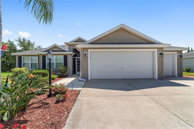1910 Quiet Oak Ct, The Villages, FL 32162 - ranch-style house with driveway and a garage
