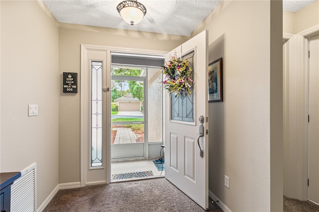 4083 Capland Ave, Clermont, FL 34711 - entryway featuring carpet and a textured ceiling