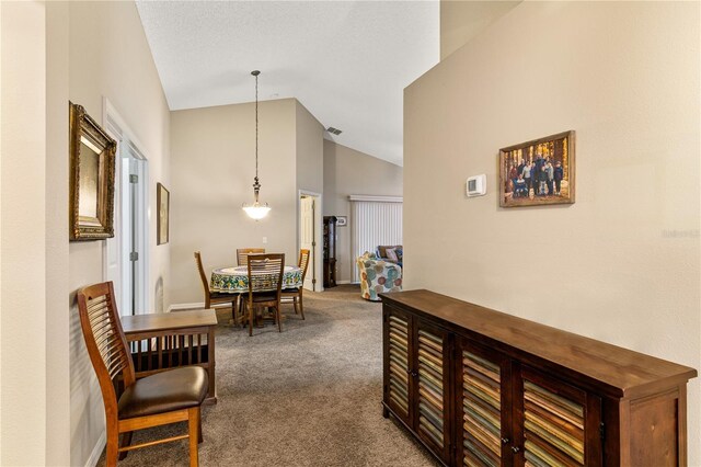 4083 Capland Ave, Clermont, FL 34711 - carpeted dining room featuring high vaulted ceiling
