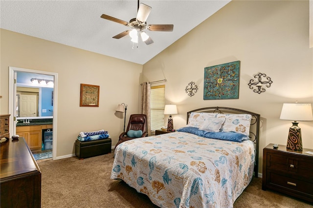4083 Capland Ave, Clermont, FL 34711 - carpeted bedroom featuring a sink, ensuite bath, a ceiling fan, baseboards, and high vaulted ceiling