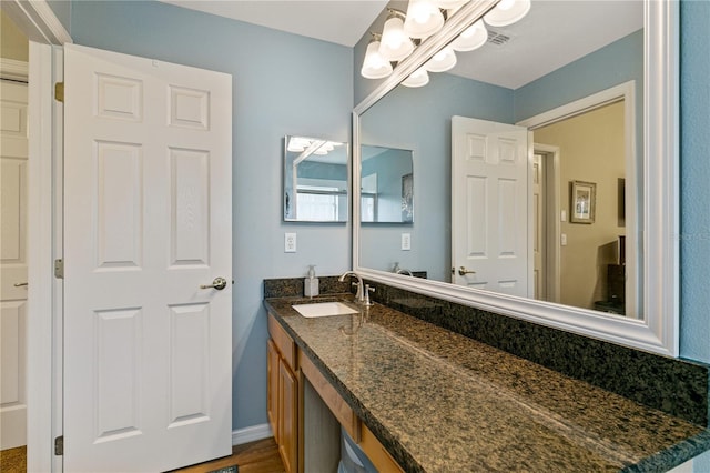 4083 Capland Ave, Clermont, FL 34711 - bathroom with a chandelier and vanity