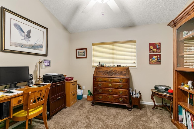 4083 Capland Ave, Clermont, FL 34711 - home office featuring a textured ceiling, ceiling fan, carpet, baseboards, and vaulted ceiling