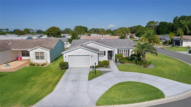 2785 Privada Dr, The Villages, FL 32162 - ranch-style house with driveway, an attached garage, a front yard, and a residential view